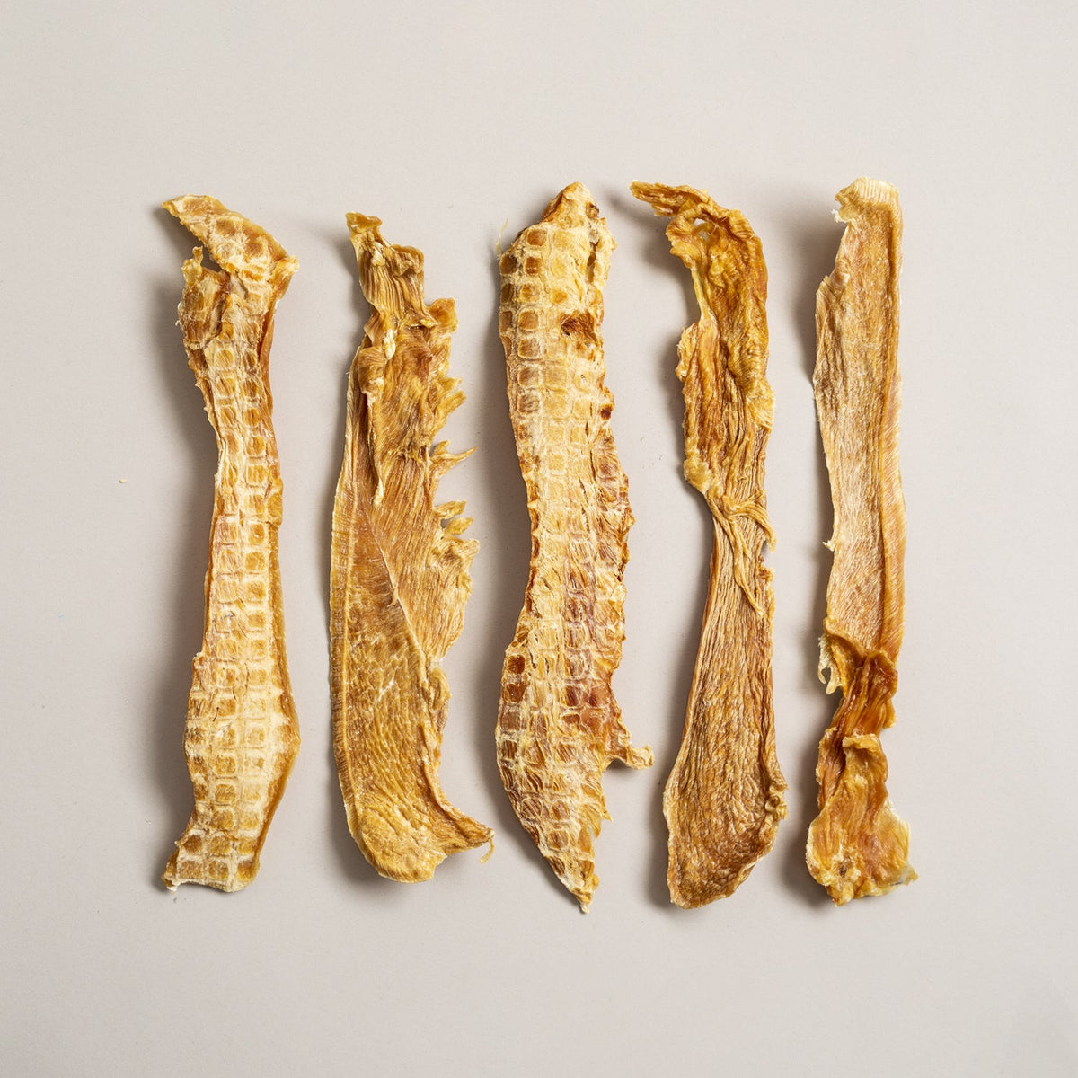Loose dehydrated Polkadog chicken strip jerky dog treats