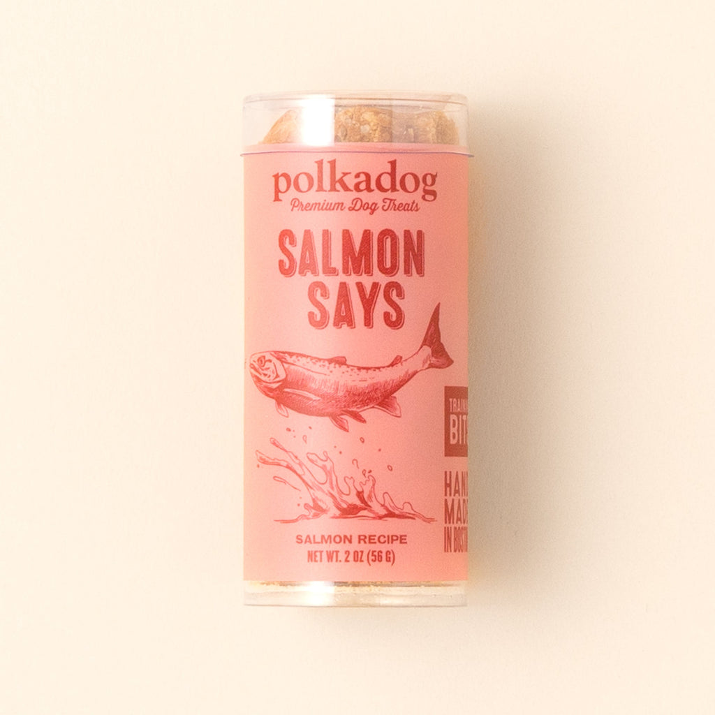 Polkadog Salmon Says Training Bits 2oz mini tube on a beige background