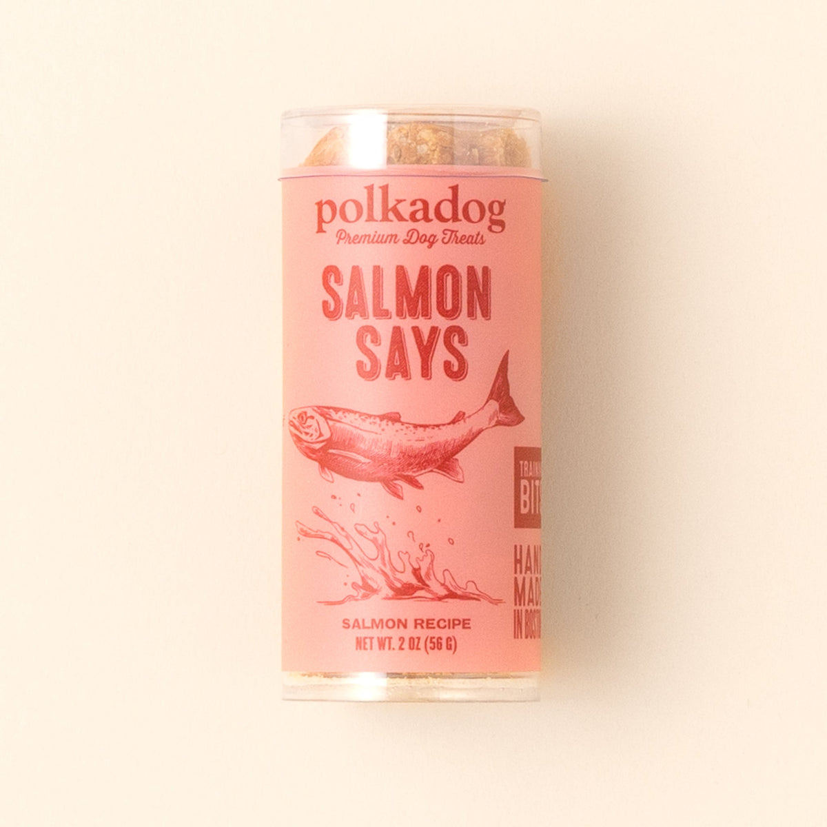 Polkadog Salmon Says Training Bits 2oz mini tube on a beige background