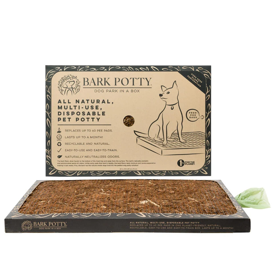 Bark Potty large all-natural disposable dog potty with bark surface tray and branded packaging on a white background.