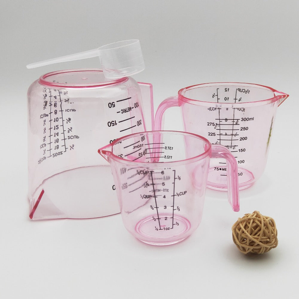 Pink Four-Piece Measuring Set with 150ml, 300ml and 600ml Cups, 20ml Spoon and Multi-Unit Markings