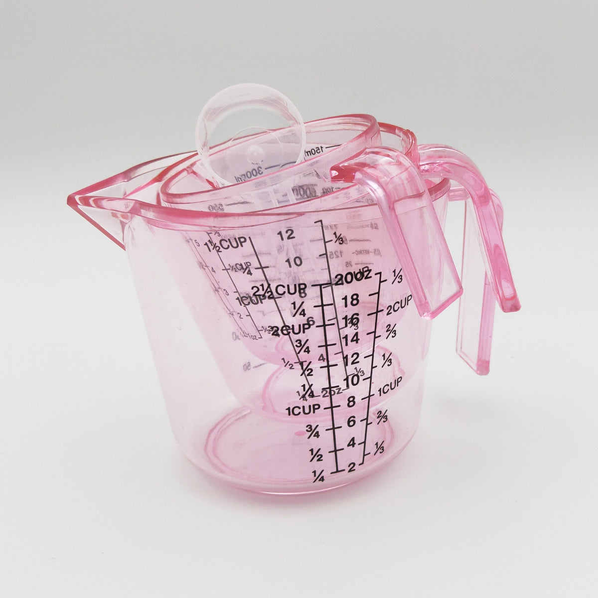 Pink Four-Piece Measuring Set with 150ml, 300ml and 600ml Cups, 20ml Spoon and Multi-Unit Markings