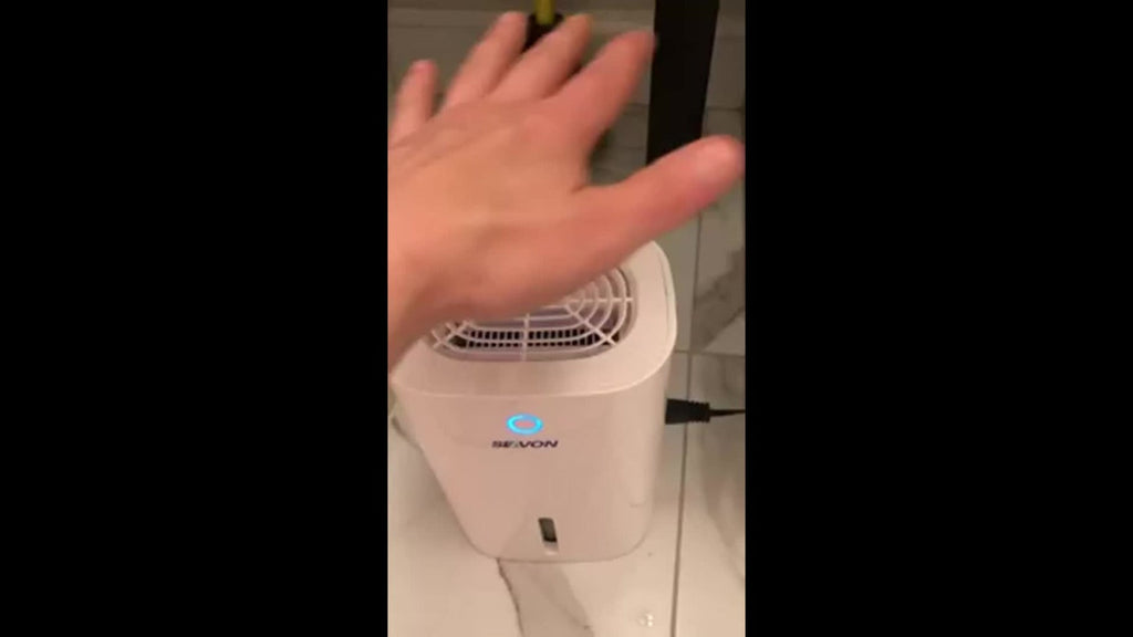 Compact 27-Ounce Peltier Dehumidifier with One-Button Control, Water-Level Window and Full-Tank Shutoff
