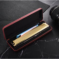 Golden 28-Hole Wide-Diapason Harmonica with Black Storage Box and Pictured Cleaning Accessories