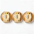 Three-Piece Random Glitter Dumpling Squishy Set with Stretchy Figures in Steamer-Style Containers