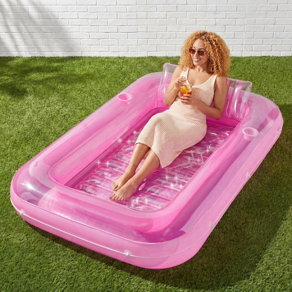 70 x 46-Inch Inflatable Pool Float Tanning Bed in Pink and White with Open Center and Raised Pillow