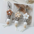 Three-Piece Mini Flower Keychain Set with Brown, Beige and White Floral Charms, Beaded Strands and Metal Clasps
