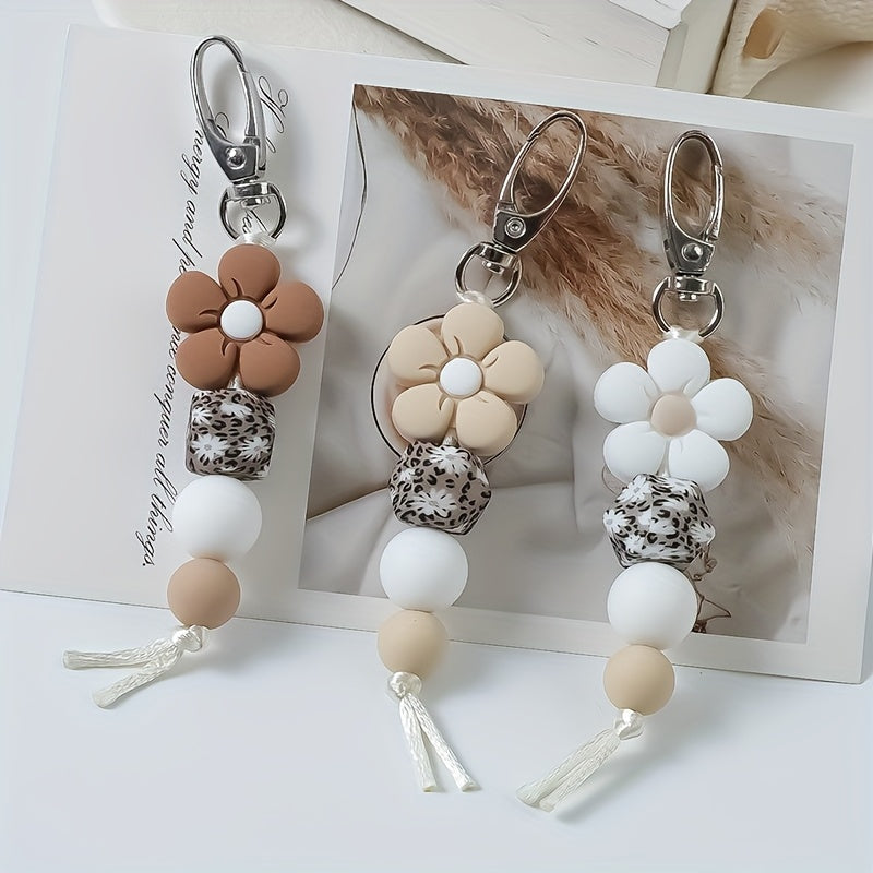 Three-Piece Mini Flower Keychain Set with Brown, Beige and White Floral Charms, Beaded Strands and Metal Clasps