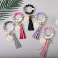 Five-Piece Beaded Wristlet Keychain Set with MAMA Pendants, Tassels and Gray, Red, Black, Purple and Pink Colors