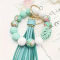 Keychain Wristlet with Silicone Beads, Leaf Charm, Tassel, Gold-Tone Rings and Lake Blue Floral Color Mix