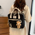 Nylon Messenger Bag with Adjustable Strap and Character Accent in Five Colors with the Listed Color, Size or Set Options for Everyday Carry