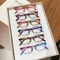 Six-Pair Oval Floral Reading Glasses Set with +100 to +400 Checkout Strength Labels and Mixed Frames
