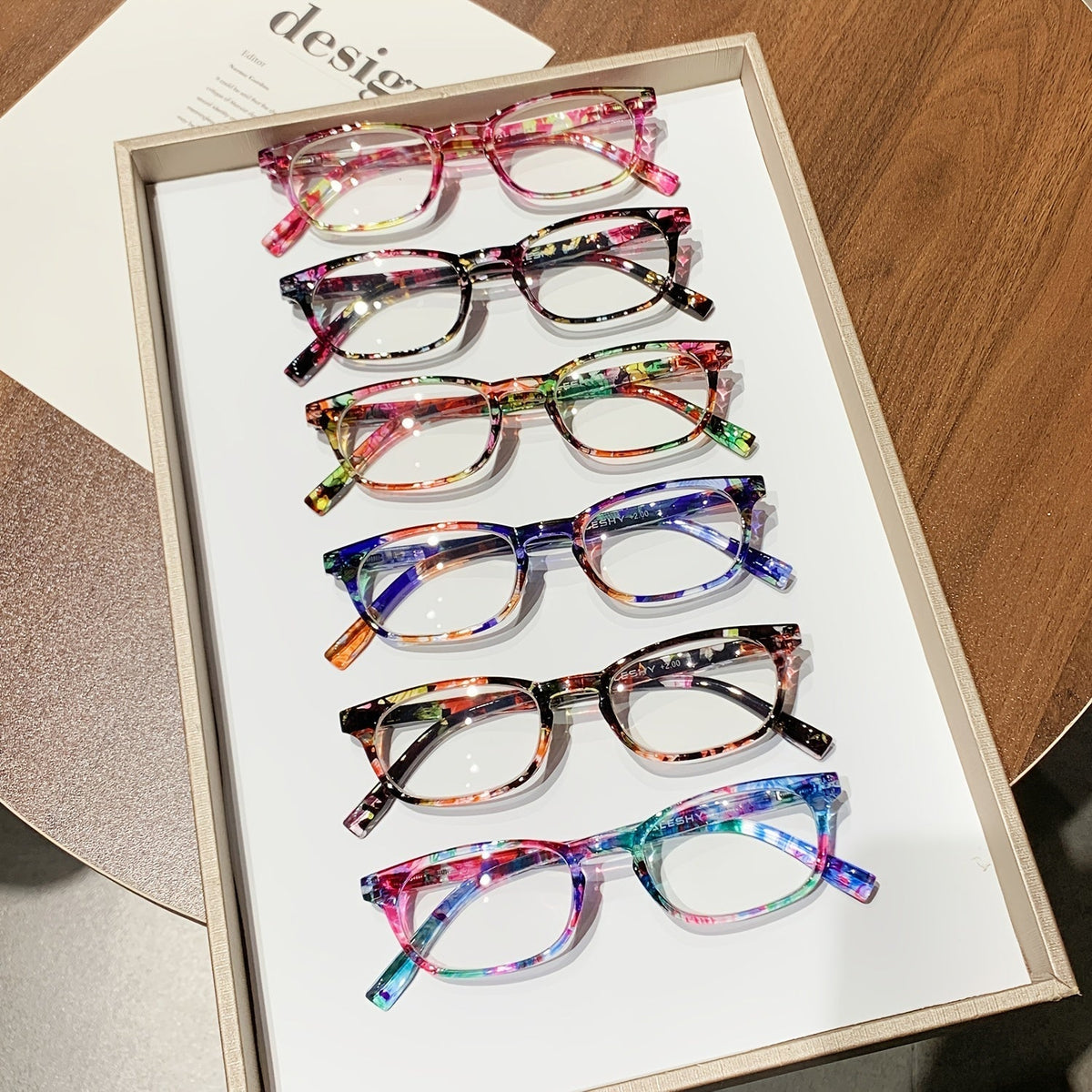 Six-Pair Oval Floral Reading Glasses Set with +100 to +400 Checkout Strength Labels and Mixed Frames