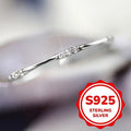 Slim Silver-Tone Wave Ring with Clear Stone Accents and Five Checkout Sizes from 6 through 10