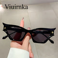 Black Cat-Eye Sunglasses for Women with Wide Retro Rim, Bold Angular Temples and Party-Ready Style