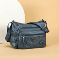 Embossed Floral Multi-Pocket Crossbody Bag with Adjustable Strap, Zip Closure and 6 Color Options