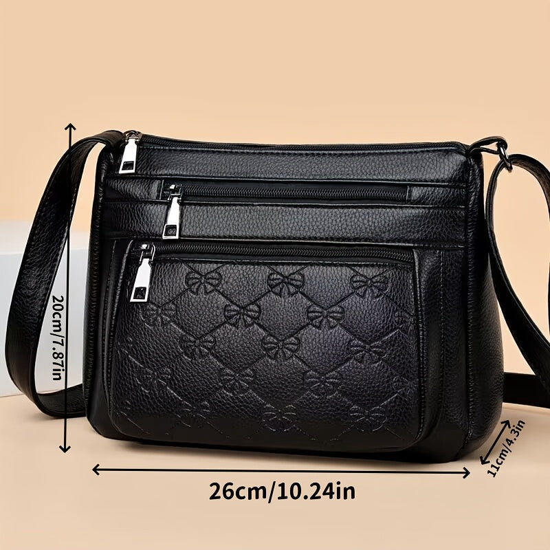 Quilted-Panel Nylon Crossbody Bag with 10-Pocket Organizer, Zip Closure and Adjustable Strap in Black